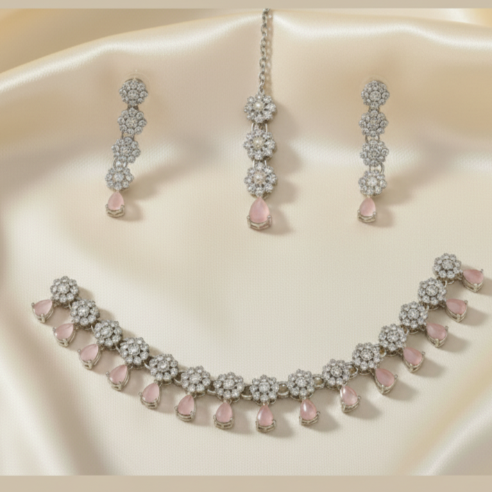 Necklace and earrings set with pink stones