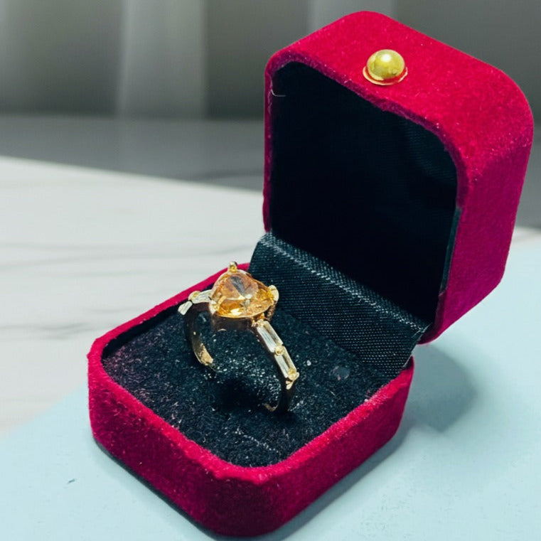 Ring with Large Central Heart-Shaped Gemstone