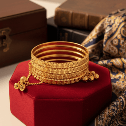 4 Artificial Gold Colour Bangle Set with Bell Charms - Stainless steel by Zehnoor | Bangles