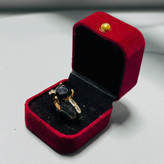 Ring with Black Heart-Shaped Gemstone